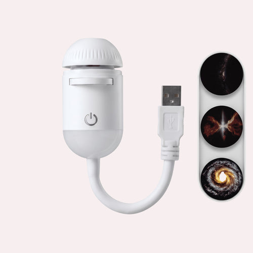 MelixTech Dream Projector, a white portable USB night light that projects galaxy and space patterns onto surfaces.